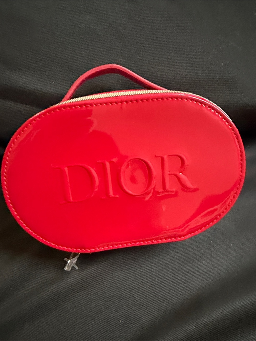 Dior Red Patent Oval Cosmetic Case with Embossed Logo